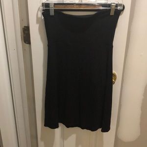 Strapless black dress that can double as a skirt